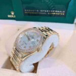 Rolex Day-Date 36 Mother of Pearl Dial Gold Diamond Bezel Watch 128348RBR-0017 128348RBR