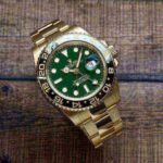 Rolex GMT Master II 116718 LN 40mm Yellow Gold Stainless Steel Automatic Green Dial