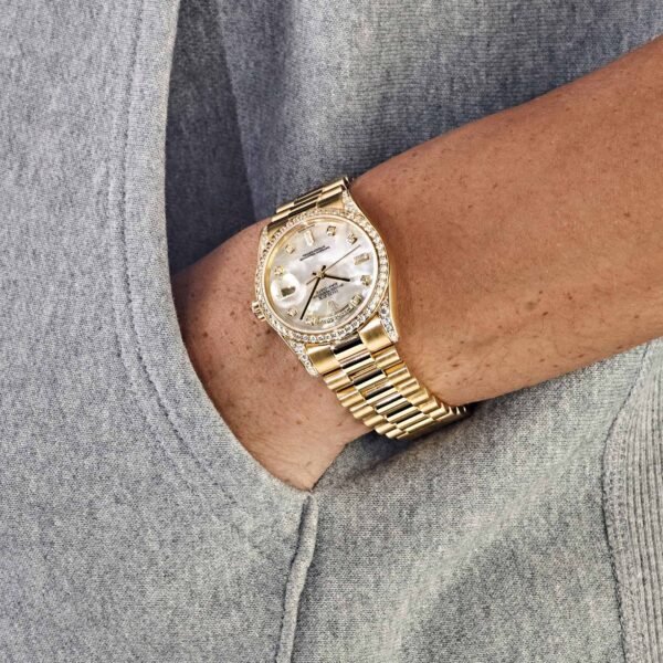 Rolex Day-Date 118388 Yellow Gold White Mother of Pearl Dial Diamond Bezel