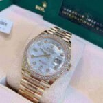 Rolex Day-Date 36 Mother of Pearl Dial Gold Diamond Bezel Watch 128348RBR-0017 128348RBR